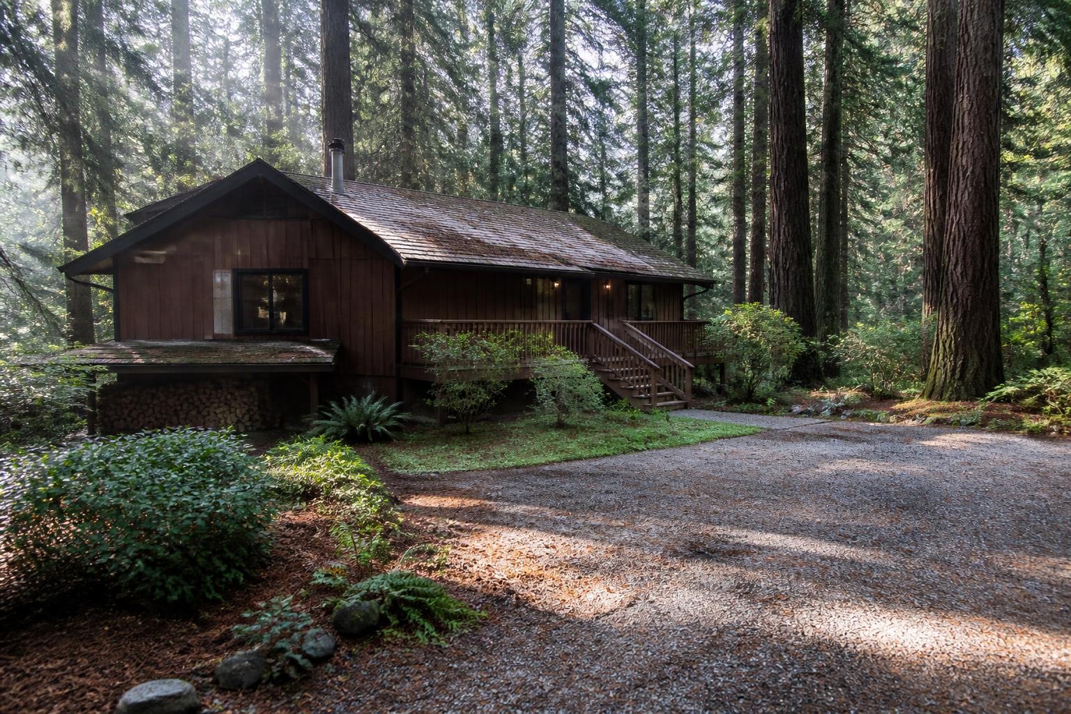 Redwood mountain home with a cleared landscaped yard